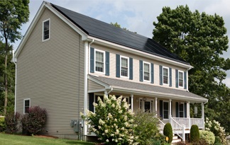 Bild: Einfamilienhaus mit Solarthermie auf dem Dach